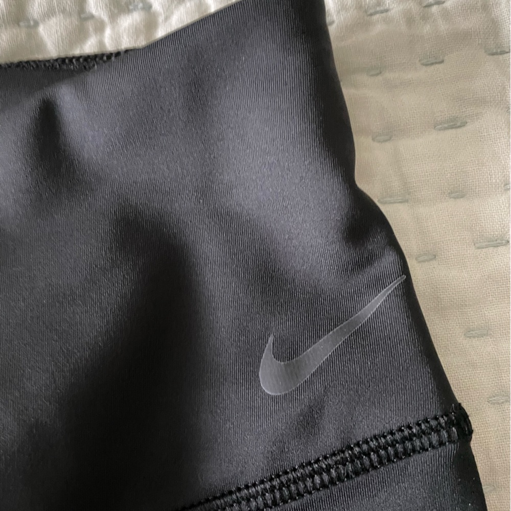 Nike leggings with tri-stripes on both sides
